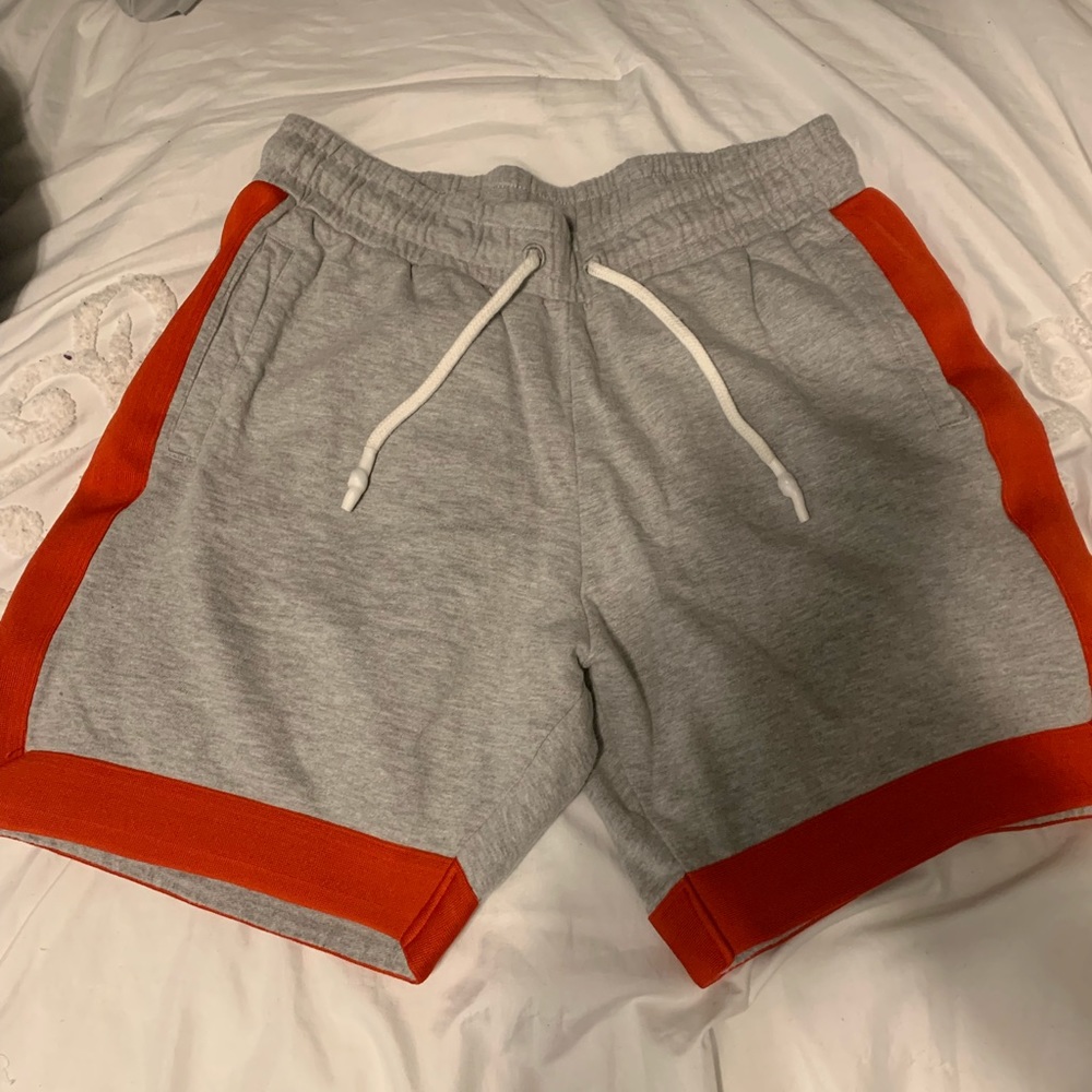 Grey shorts with red stripe